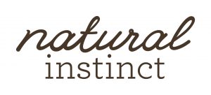 If living things act out most of their behaviors because they are programmed to do so, who programmed them in the first place?